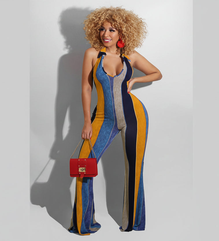 A model wearing a sleeveless, form-fitting jumpsuit with a flared leg design. The jumpsuit features vertical stripes in shades of red, blue, and grey.