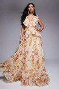 Woman wearing a floral dress against a gray background