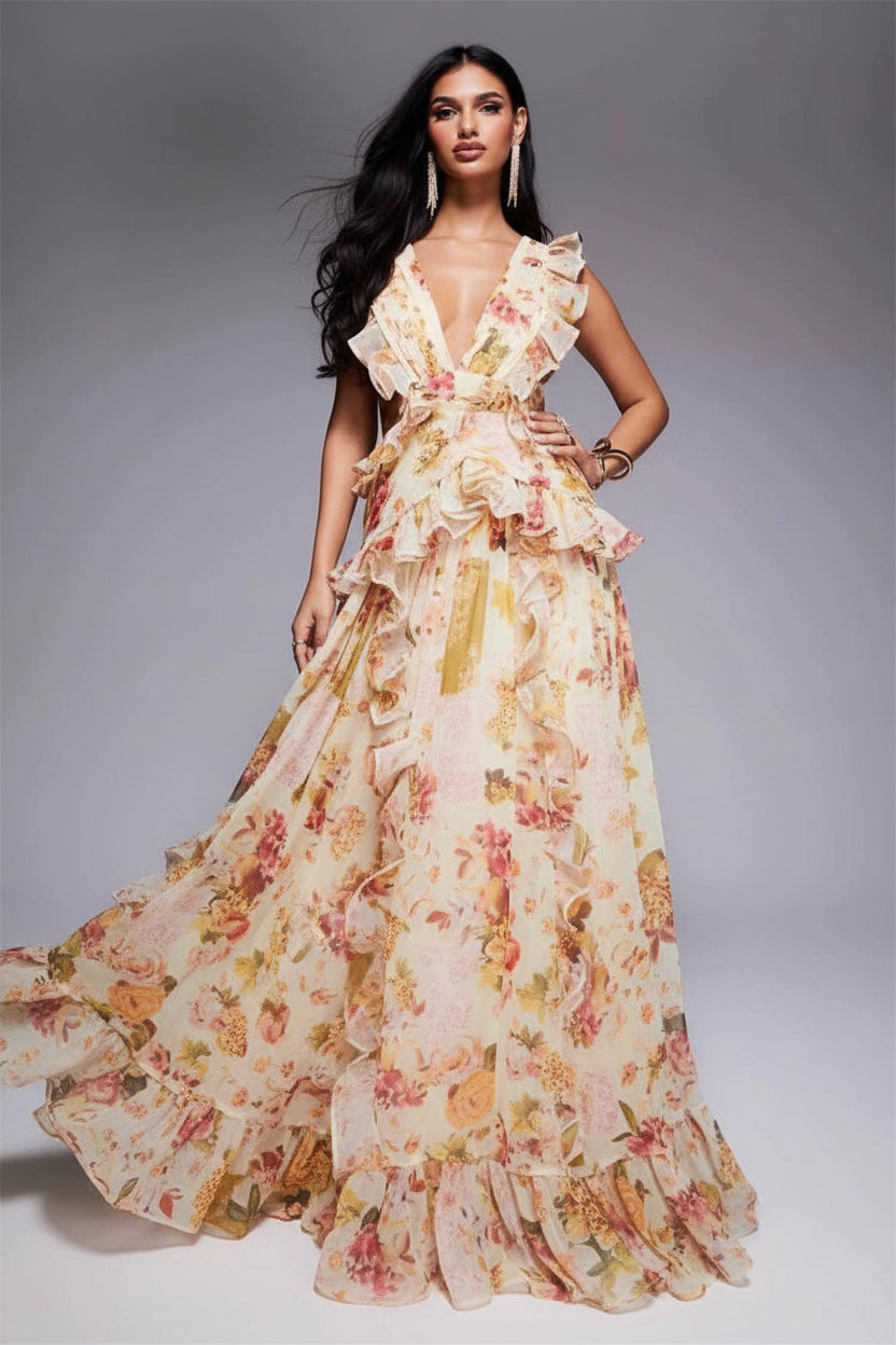 Woman wearing a floral dress against a gray background