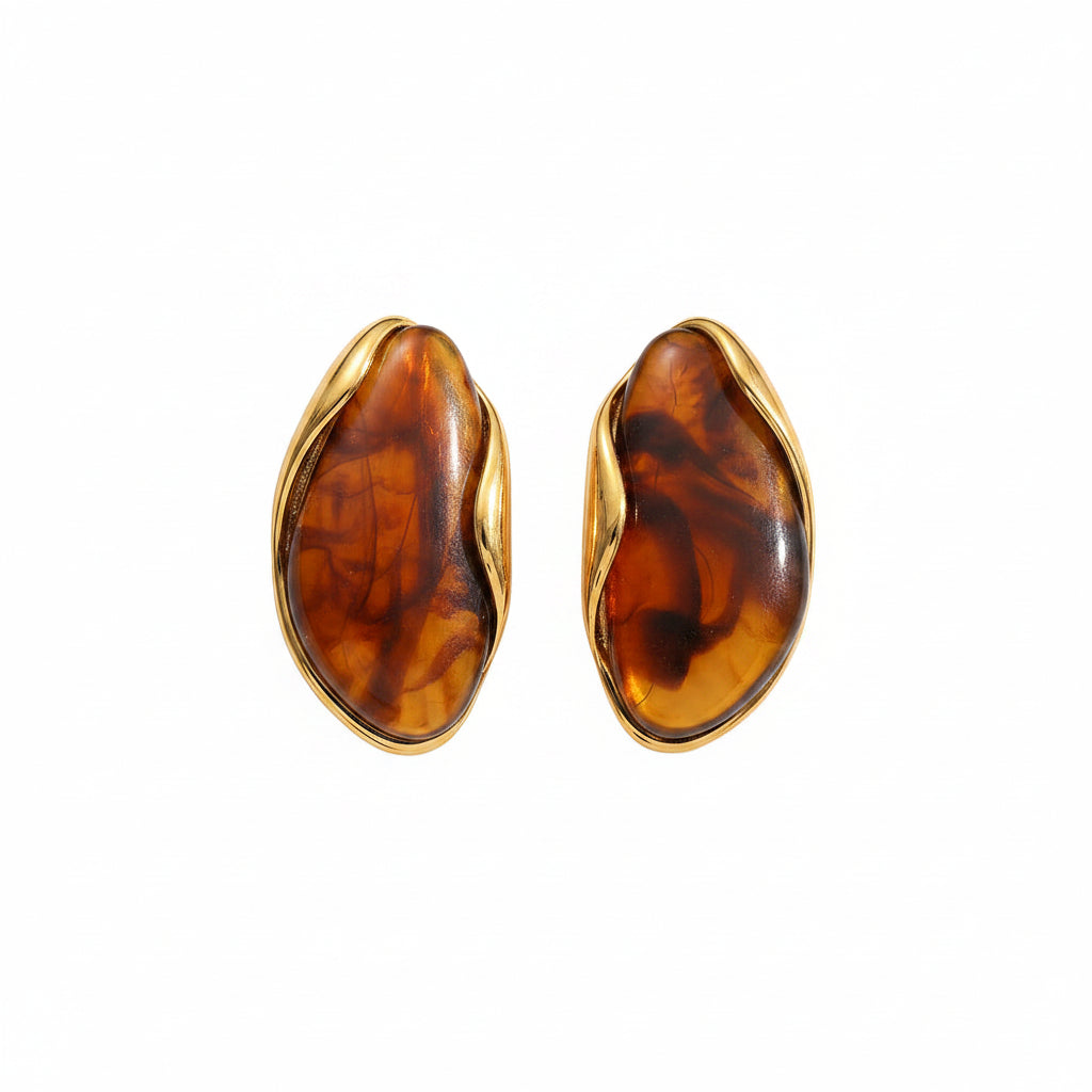 Pair of tortoiseshell earrings with gold accents, shown with measurements and weight on a white background.