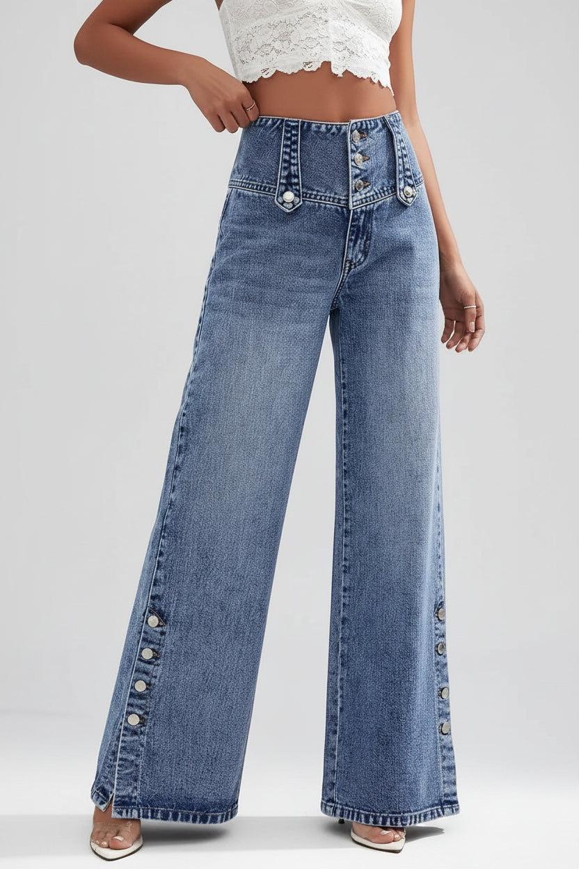 Person wearing wide-leg jeans on a city street.
