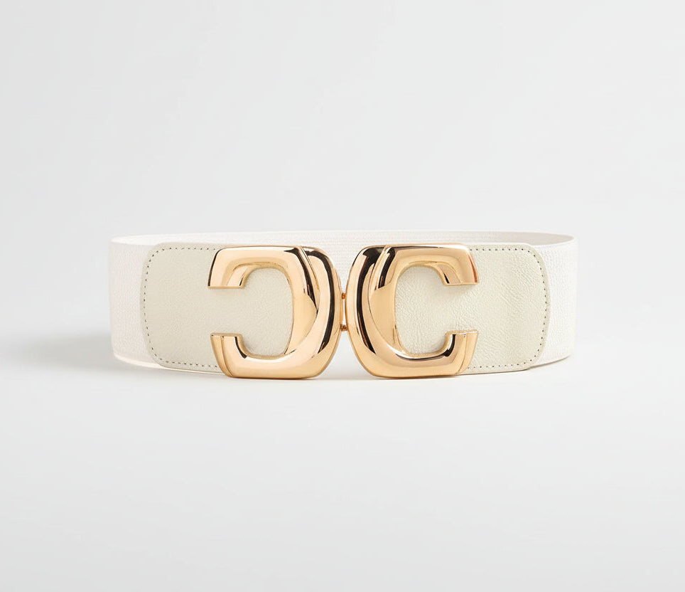 White belt with gold buckle on a white background
