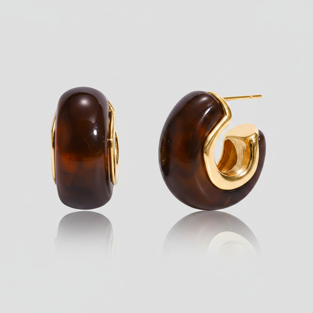 Brown earrings with gold accents on a white background, showing measurements and material details.
