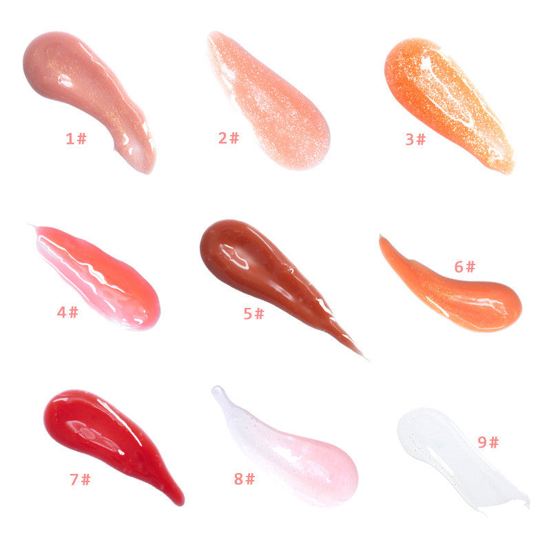 Shiny Vitamin E Mineral Oil Plumping Lip gloss Makeup