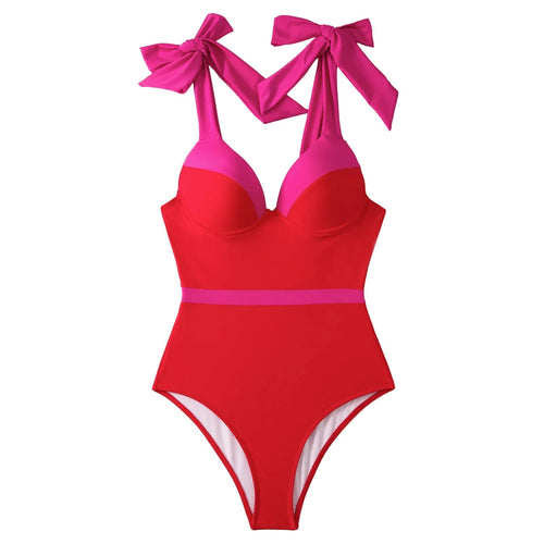 Red and pink swimsuit with pink bows on a white background