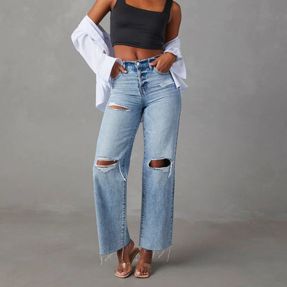 Ripped Washed Raw Heme Jeans