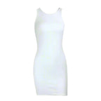 A woman wearing a white sleeveless mini dress with a crew neckline, posing against a concrete background.