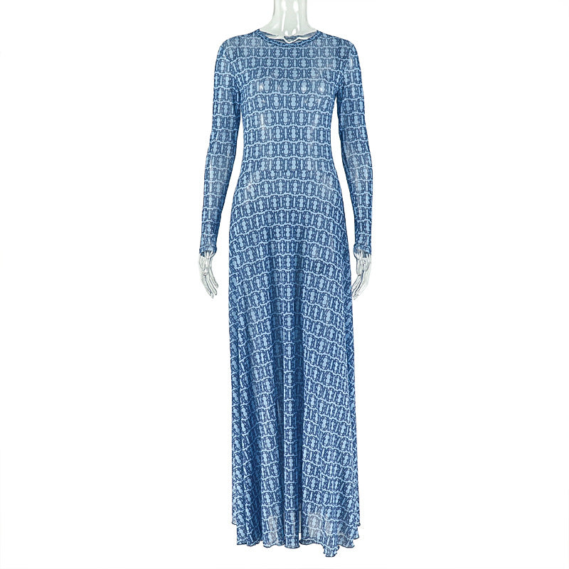 Blue patterned dress on a mannequin against a white background