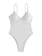 White swimsuit with thin straps on a white background