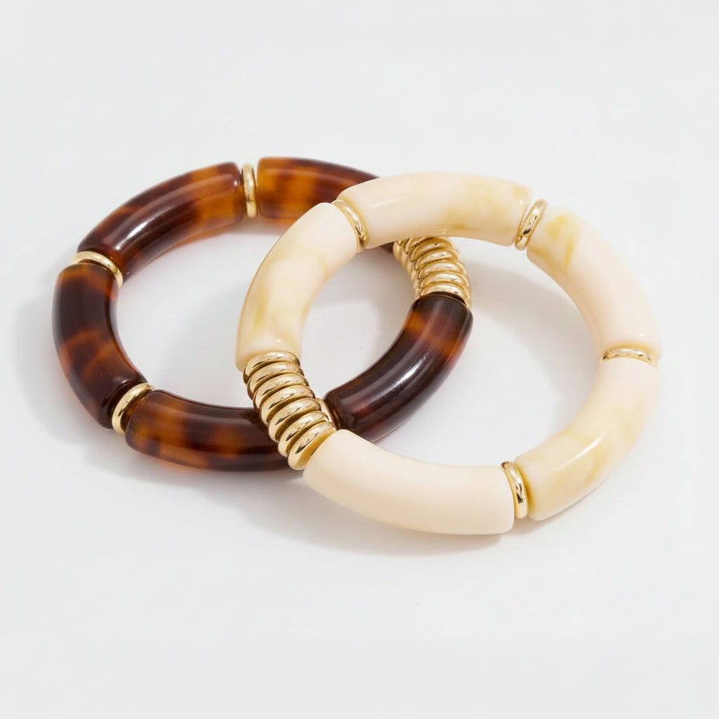 Two bracelets with measurements and product details on a white background