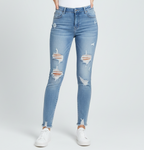 A pair of distressed slim-fit jeans with a mid-rise waist and破坏details.